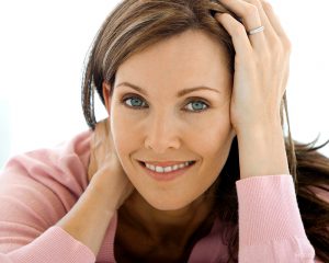 Mature Female with Green Eyes in Pink Blouse